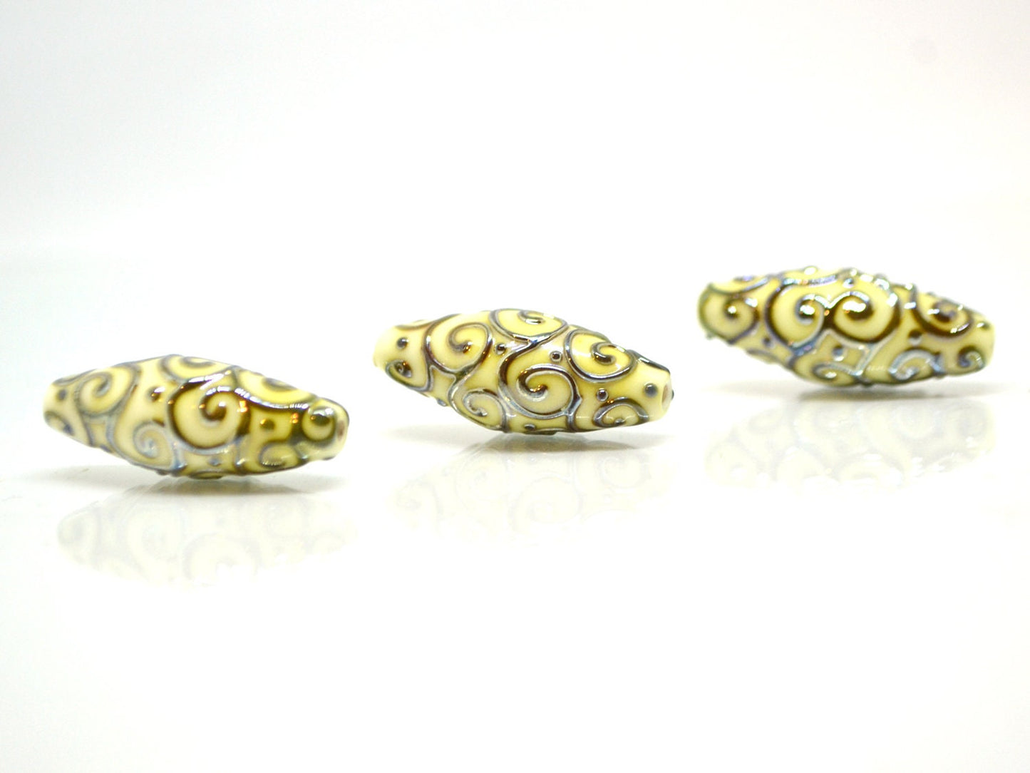 Ivory rhombus focal beads with gold curls, White milk glass beads, Mirror effect beads, Artisan lampwork