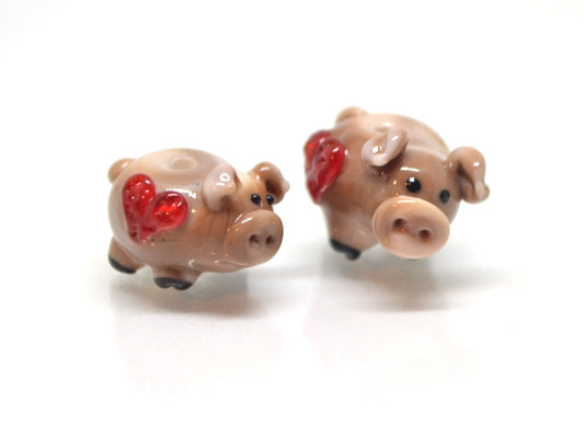 Glass beige pig beads