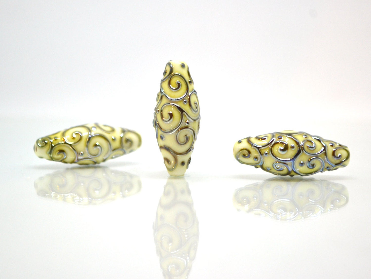 Ivory rhombus focal beads with gold curls, White milk glass beads, Mirror effect beads, Artisan lampwork