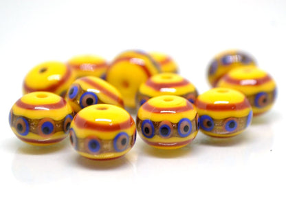 Yellow glass beads, red srtipes, Yellow lampwork beads, Rondelle glass beads, Blue dots, devil eye beads, Handmade beads