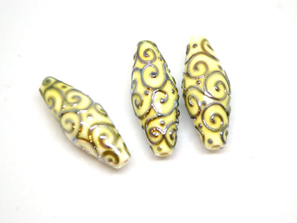 Ivory rhombus focal beads with gold curls, White milk glass beads, Mirror effect beads, Artisan lampwork