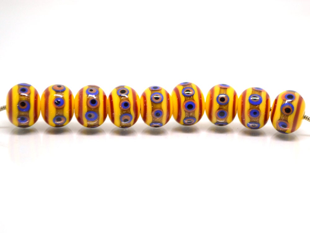 Yellow glass beads, red srtipes, Yellow lampwork beads, Rondelle glass beads, Blue dots, devil eye beads, Handmade beads