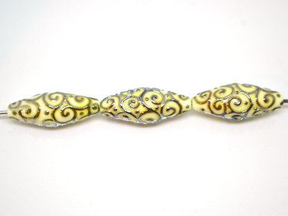 Ivory rhombus focal beads with gold curls, White milk glass beads, Mirror effect beads, Artisan lampwork