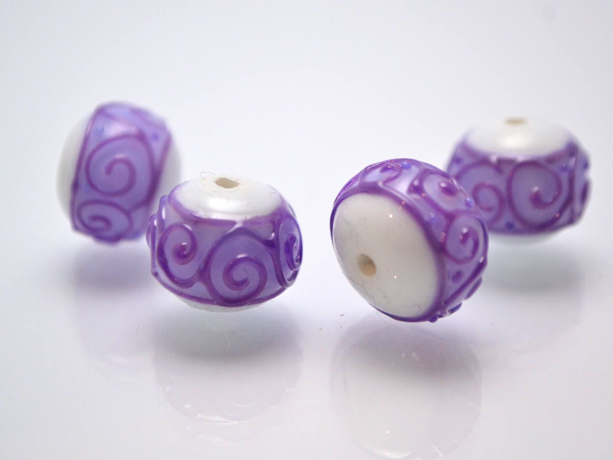 white purple lampwork glass rondelle bead handmade artisan lampwork bead set jewelry making earrings violet curl texture swirl carved beads