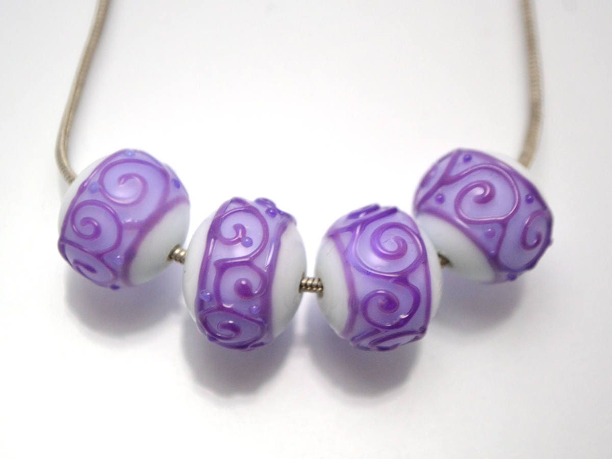 white purple lampwork glass rondelle bead handmade artisan lampwork bead set jewelry making earrings violet curl texture swirl carved beads