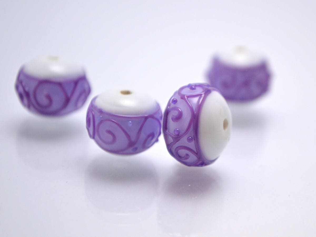 white purple lampwork glass rondelle bead handmade artisan lampwork bead set jewelry making earrings violet curl texture swirl carved beads
